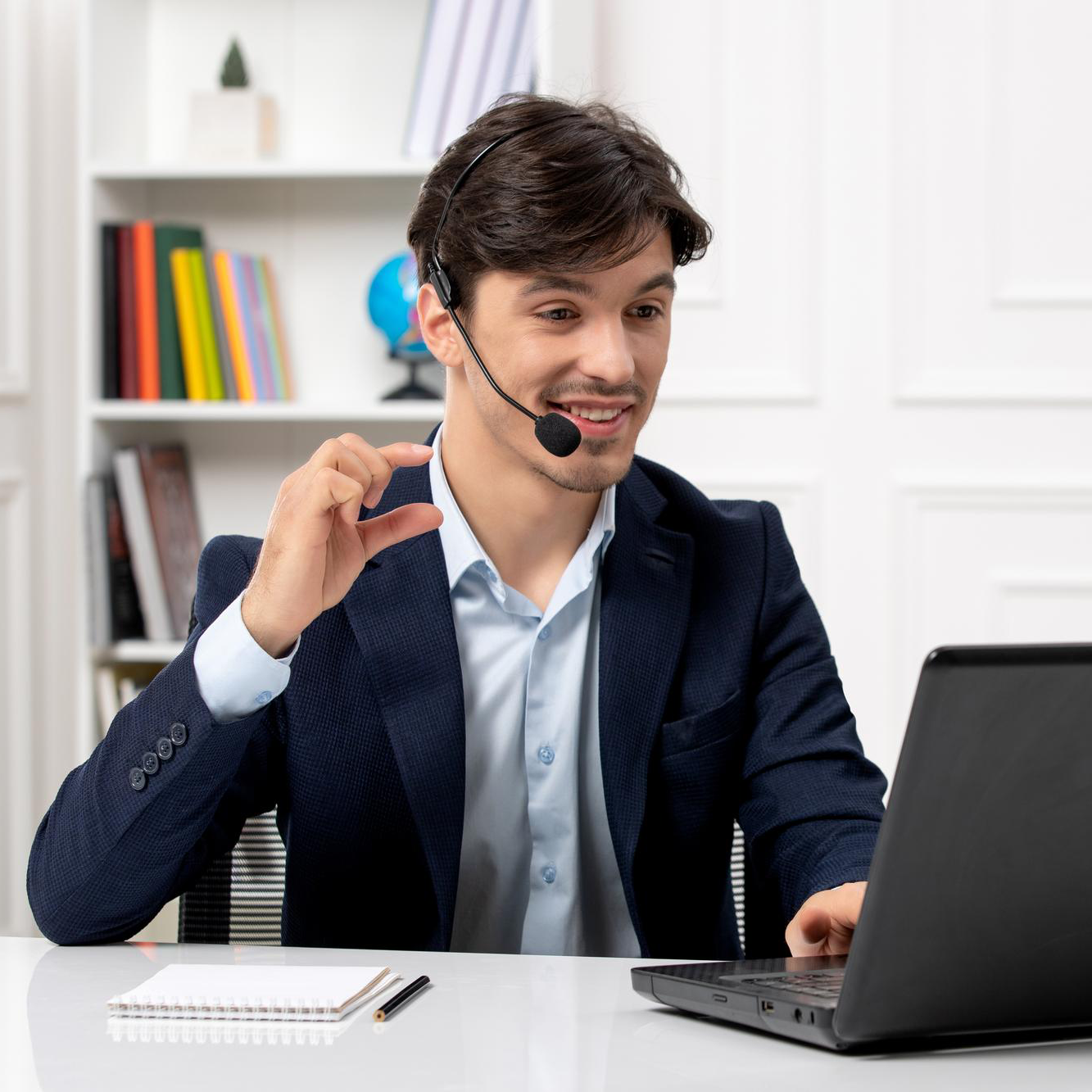 customer-service-handsome-guy-with-headset-laptop-suit-smiling-videocall